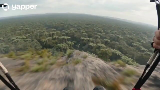 Prehistoric POV Paragliding Action